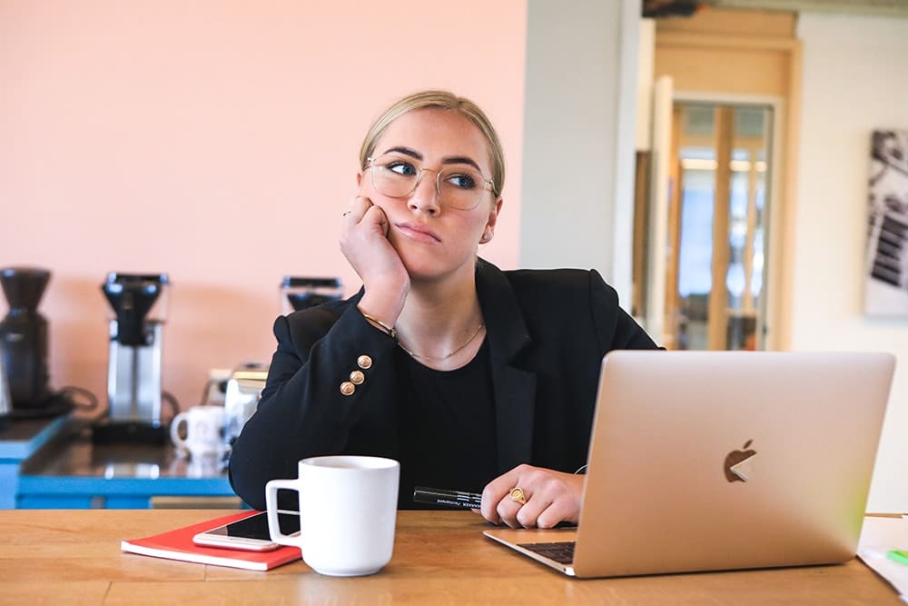 frustrated woman on laptop