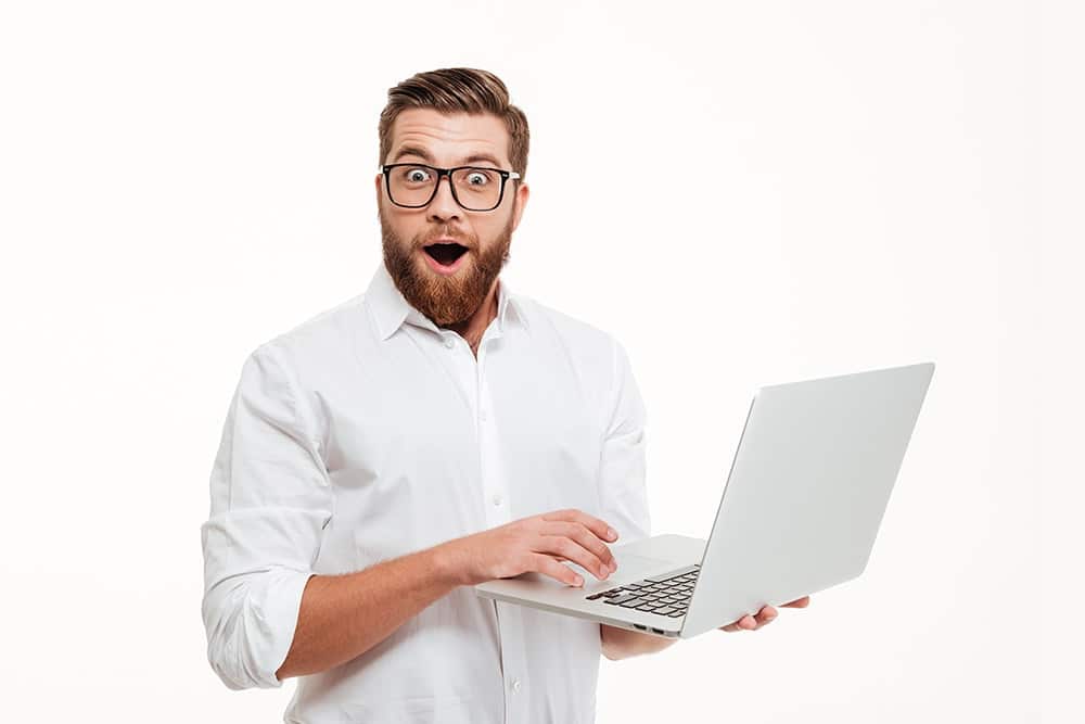 excited man laptop